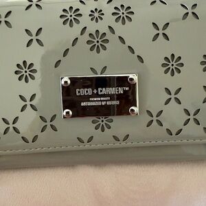 Coco + Carmen Sage Green Laser-Cut Clutch with Silver Plaque